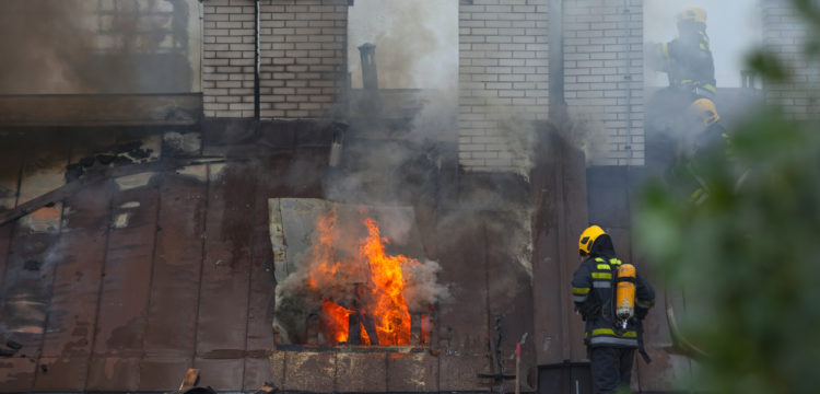 Washington firemen putting a chimney fire out